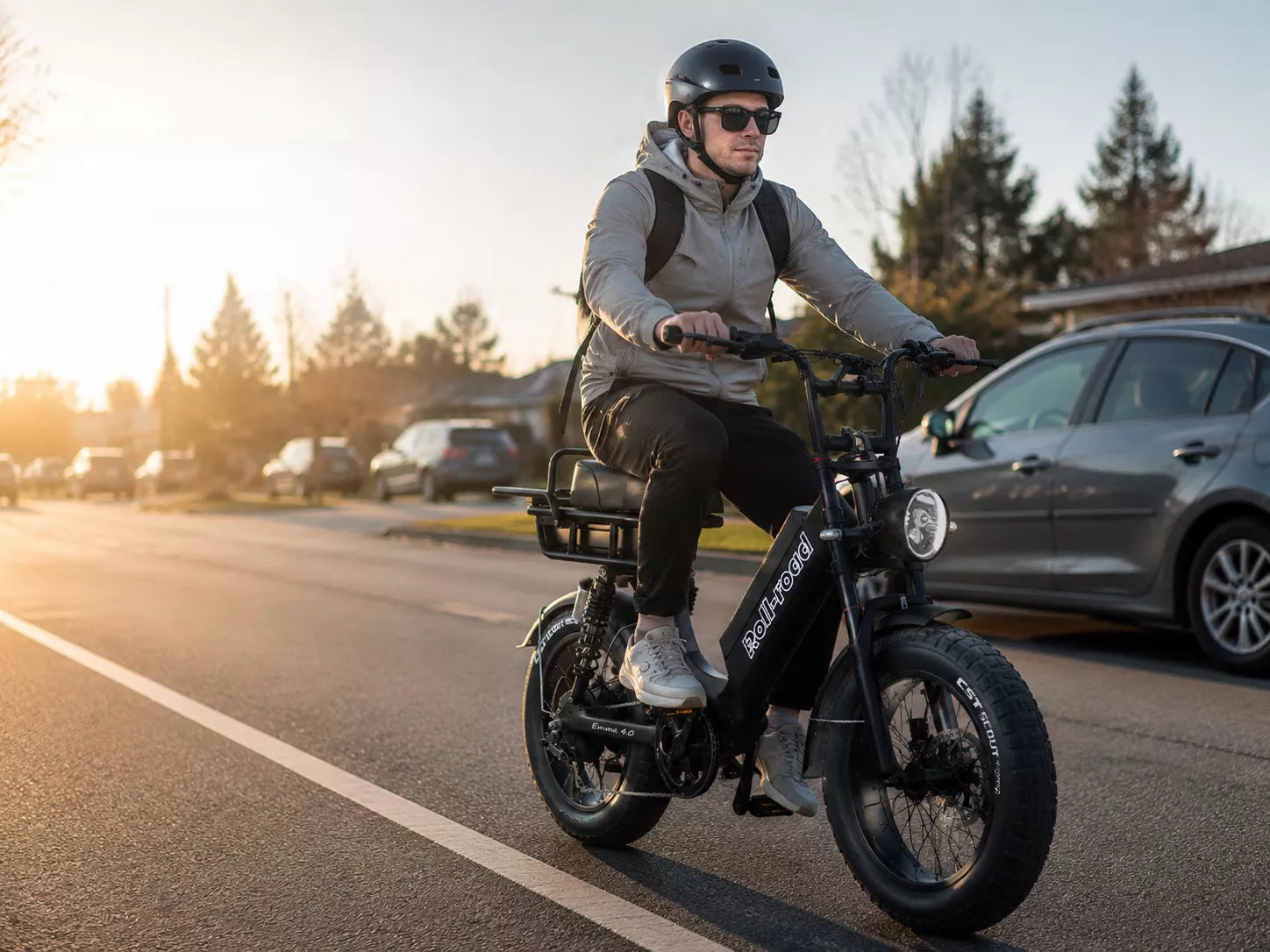 electric bike commuter riding to work instead of driving a car