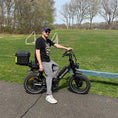 Load image into Gallery viewer, rollroad‑leon‑ebike‑customer‑outdoor‑riding‑video‑still-1.webp__PID:4262f166-4c83-4941-a37f-411a0190e07c
